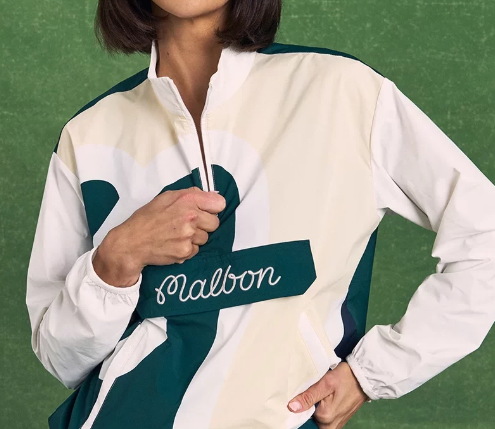 Close-up of Malbon women's windproof golf jacket on model
