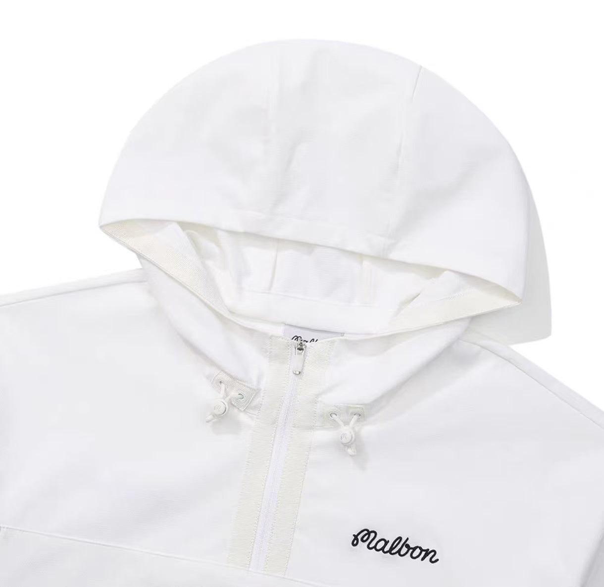 Malbon women's hooded golf jacket collar and hood detail