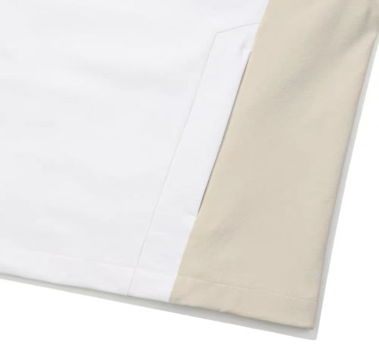 Malbon hooded lightweight golf jacket side panel detail