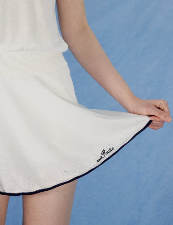 NowRose White golf skirt stretch detail with Navy trim