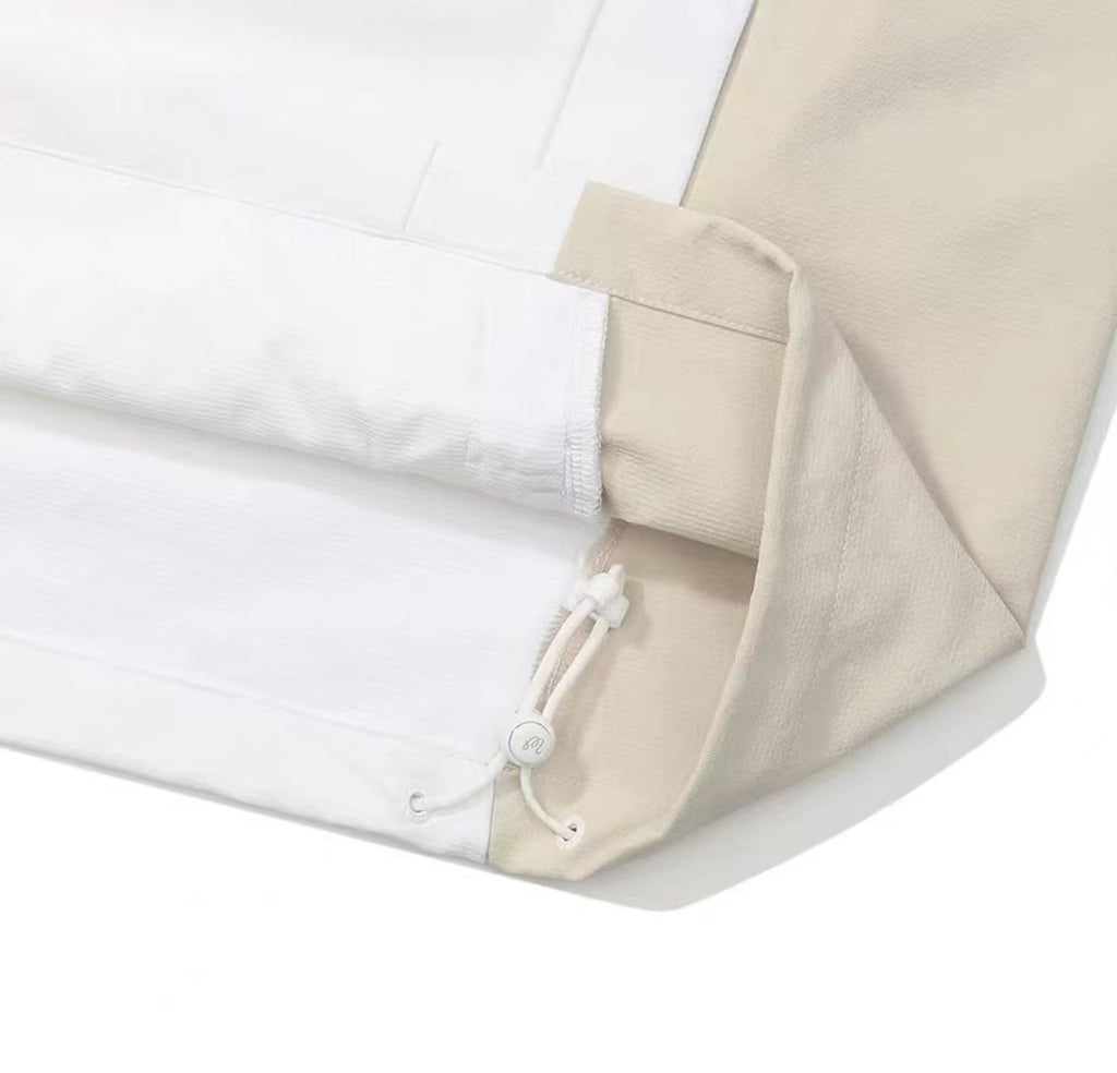 Malbon women's windproof golf jacket hem drawcord detail