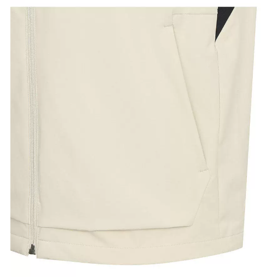 Beige Malbon golf vest pocket and hem detail