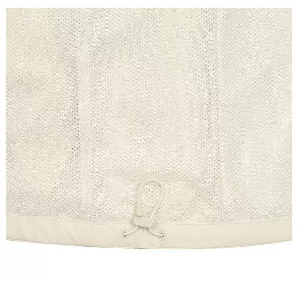 Beige Malbon golf vest fabric and hem toggle detail