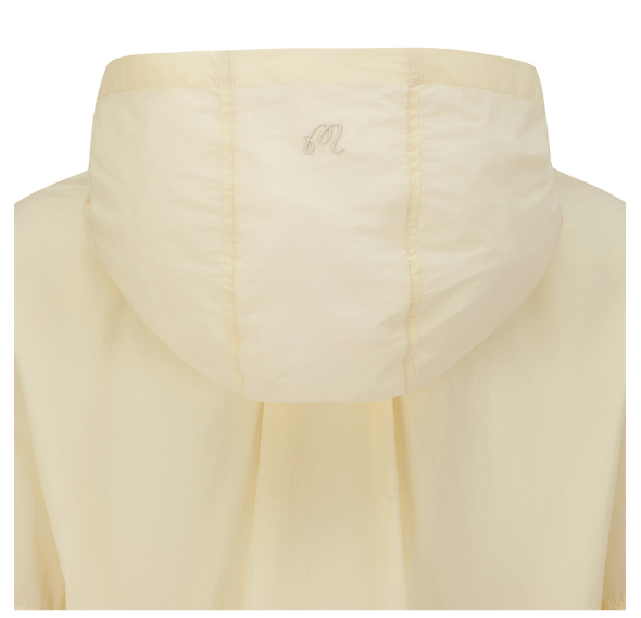Malbon women's slim-fit UV-protection breathable hoodie in Beige, lifestyle view