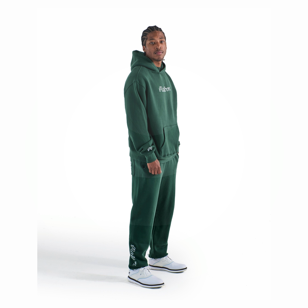 Malbon Fesque Hoodie Forest golf apparel worn side view