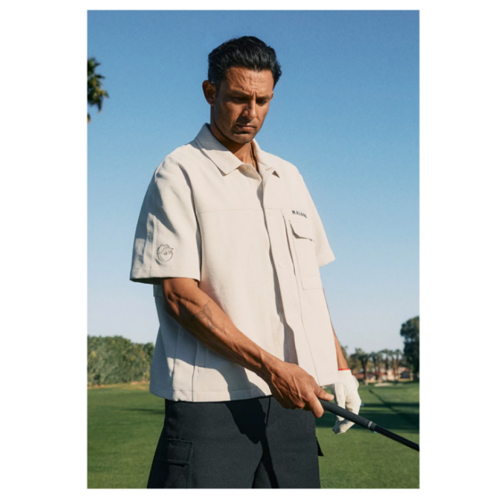 Malbon Short Sleeve Polo Shirt Beige short sleeve golf polo detail view